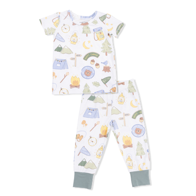 Children's pajama set with camping-themed print on a white background