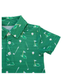 Green children's polo shirt with golf pattern on a white background
