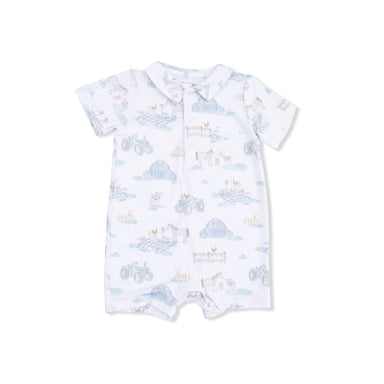 Baby romper with farm themed pattern on a white background