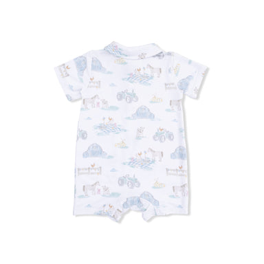 Baby romper with farm themed pattern on a white background