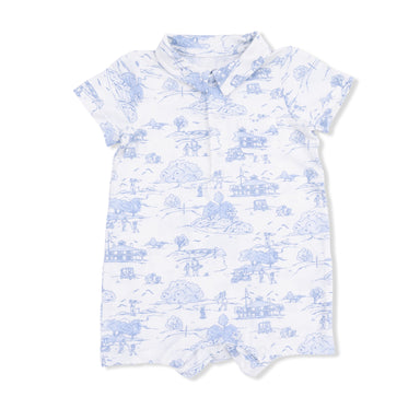 White romper with blue toile pattern on a white background