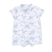 White romper with blue toile pattern on a white background