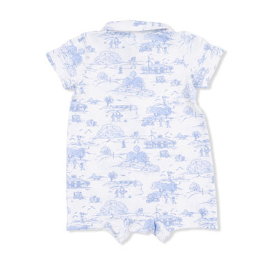 White baby romper with blue toile pattern on a white background