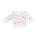 White long-sleeve shirt with pink football pattern on a white background