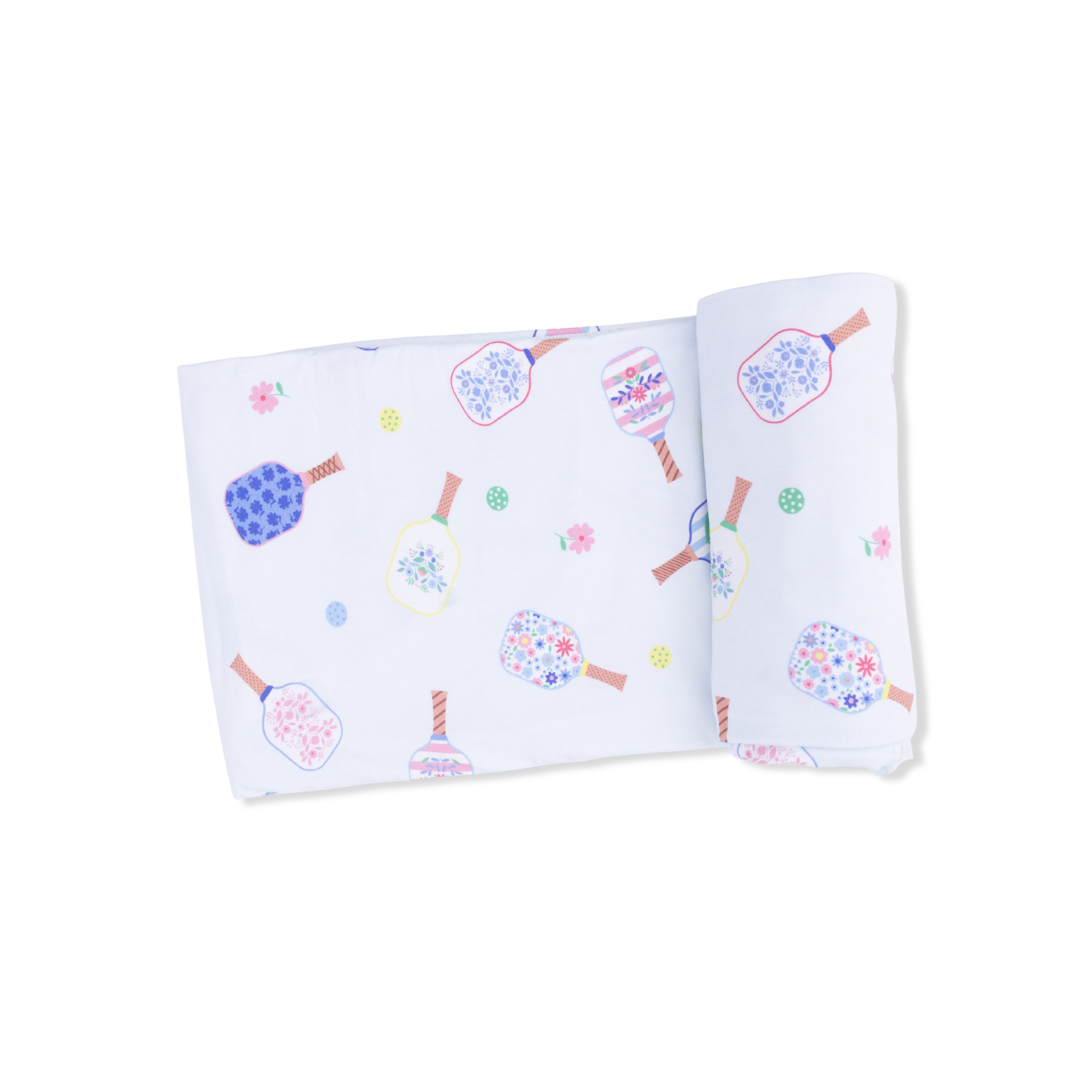 Folded fabric with colorful pickleball designs on a white background