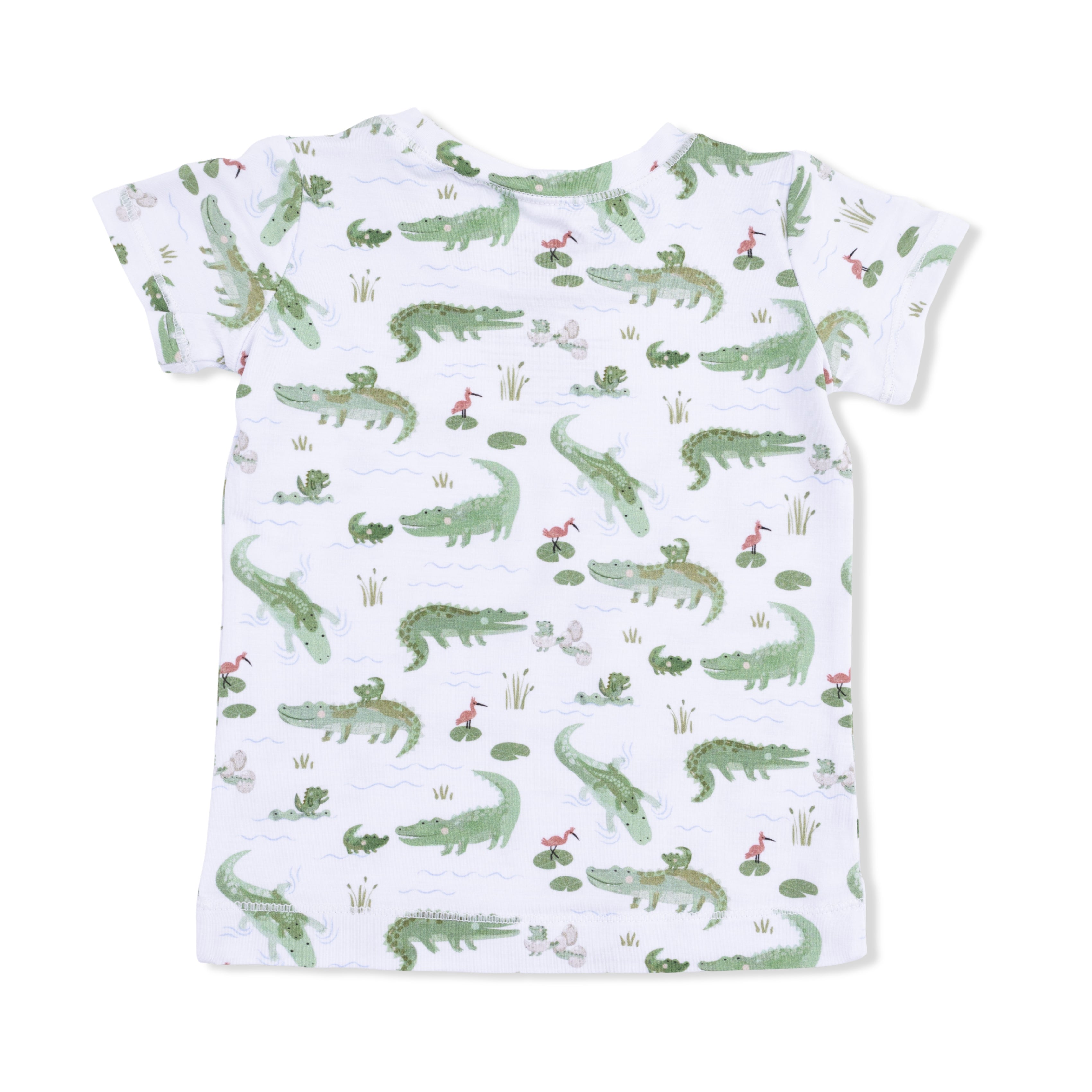 Children's t-shirt with green alligator pattern on a white background