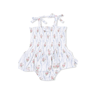 Floral-patterned romper on a white background