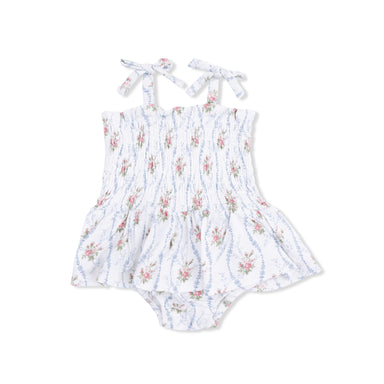 Floral-patterned romper on a light gray background