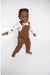 toddler boy wearing brown corduroy overalls with white onesie under
