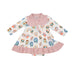 white long sleeve western skirted bodysuit with pink collar and and ruffle and pink and blue horseshoe print