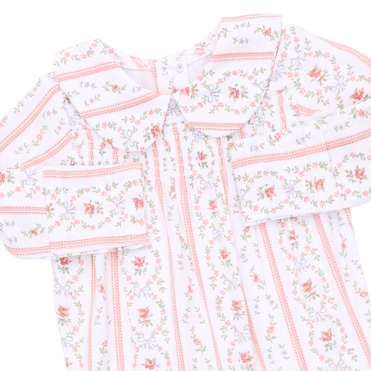 A long-sleeve button-up shirt with a white base, featuring a delicate pink and green floral pattern, vertical pink stripes, and a matching fabric tie at the collar.
