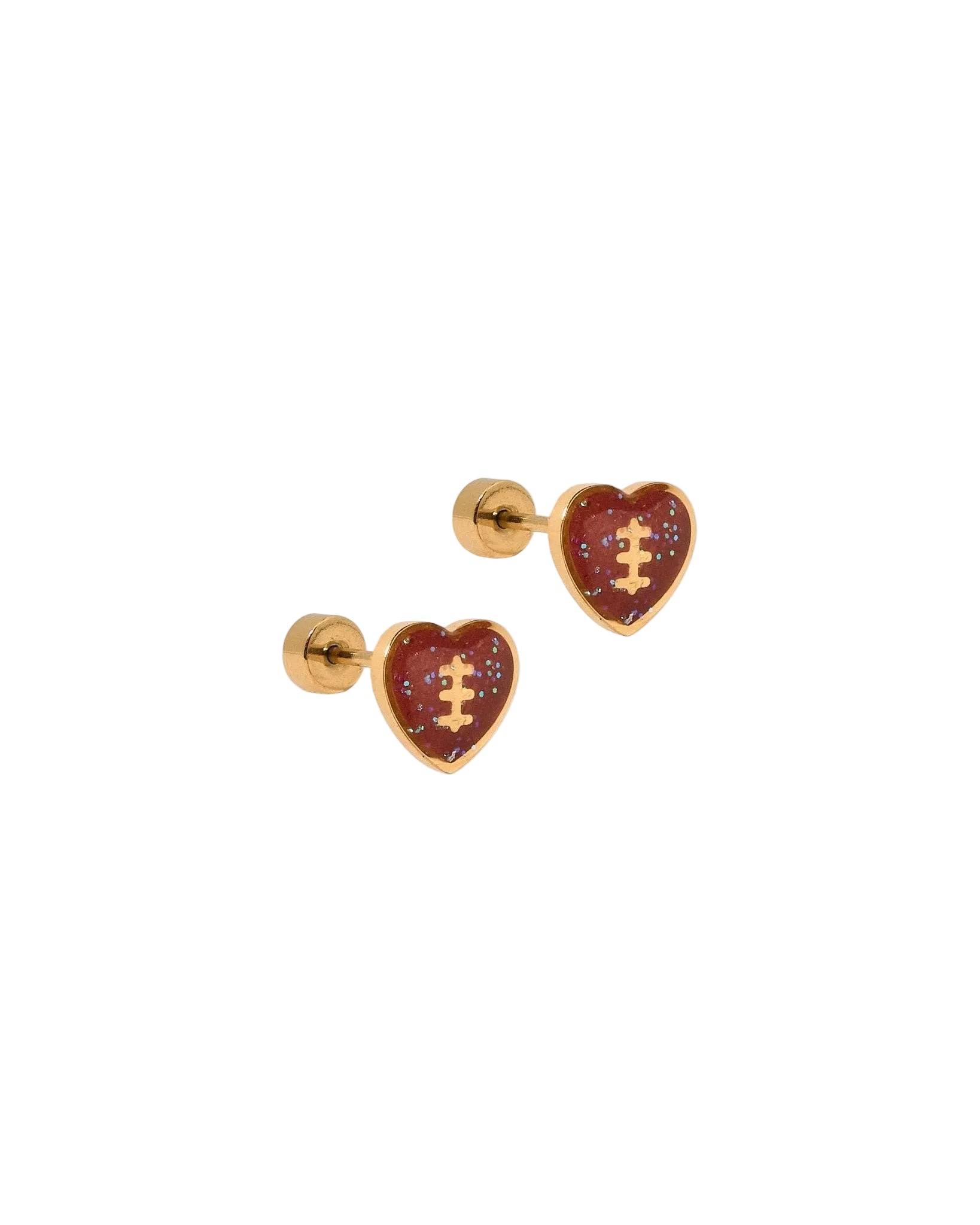 Football heart stud earrings on a white background