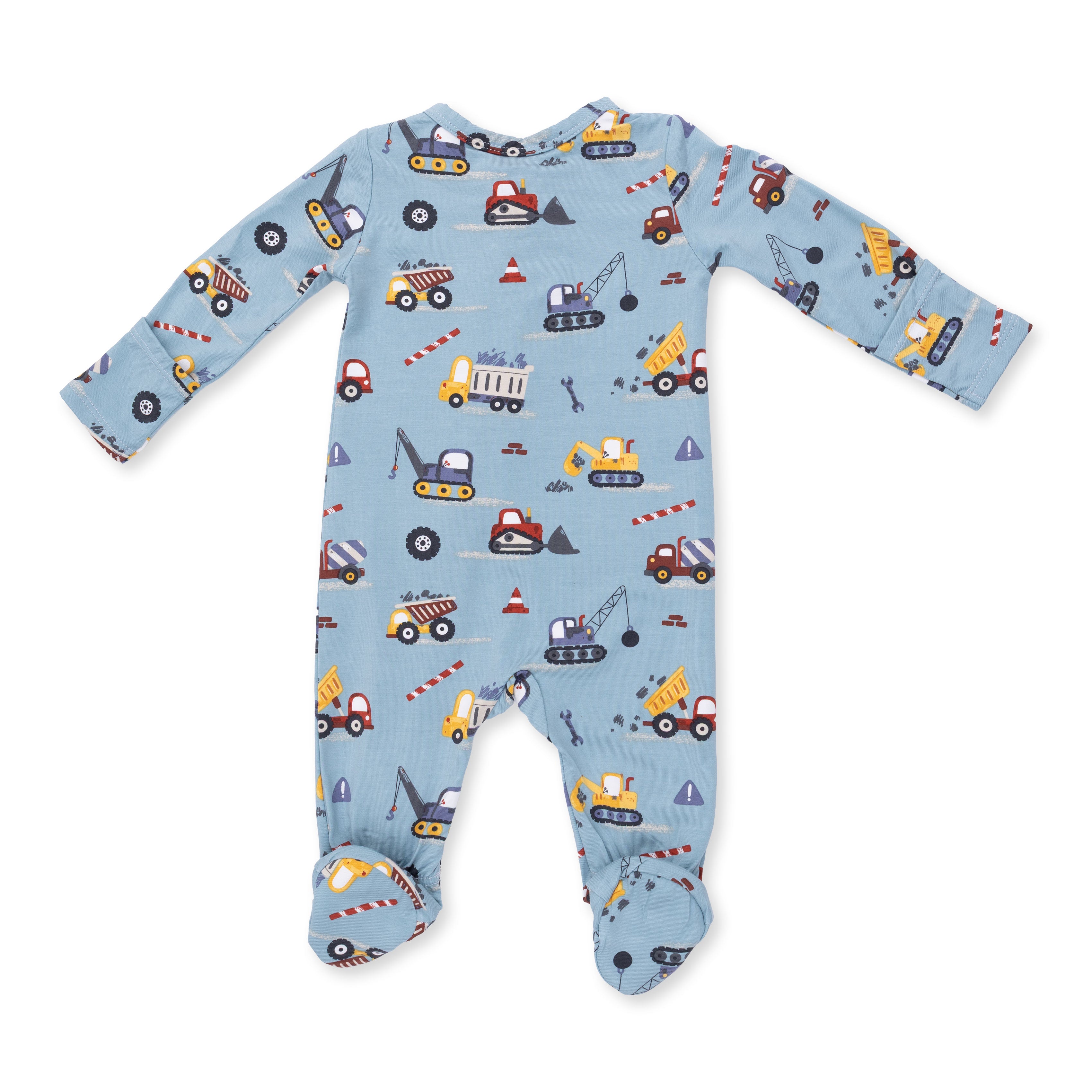 Baby onesie with construction vehicle pattern on a blue background