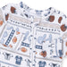 Children's pajamas with sports-themed design on a white background