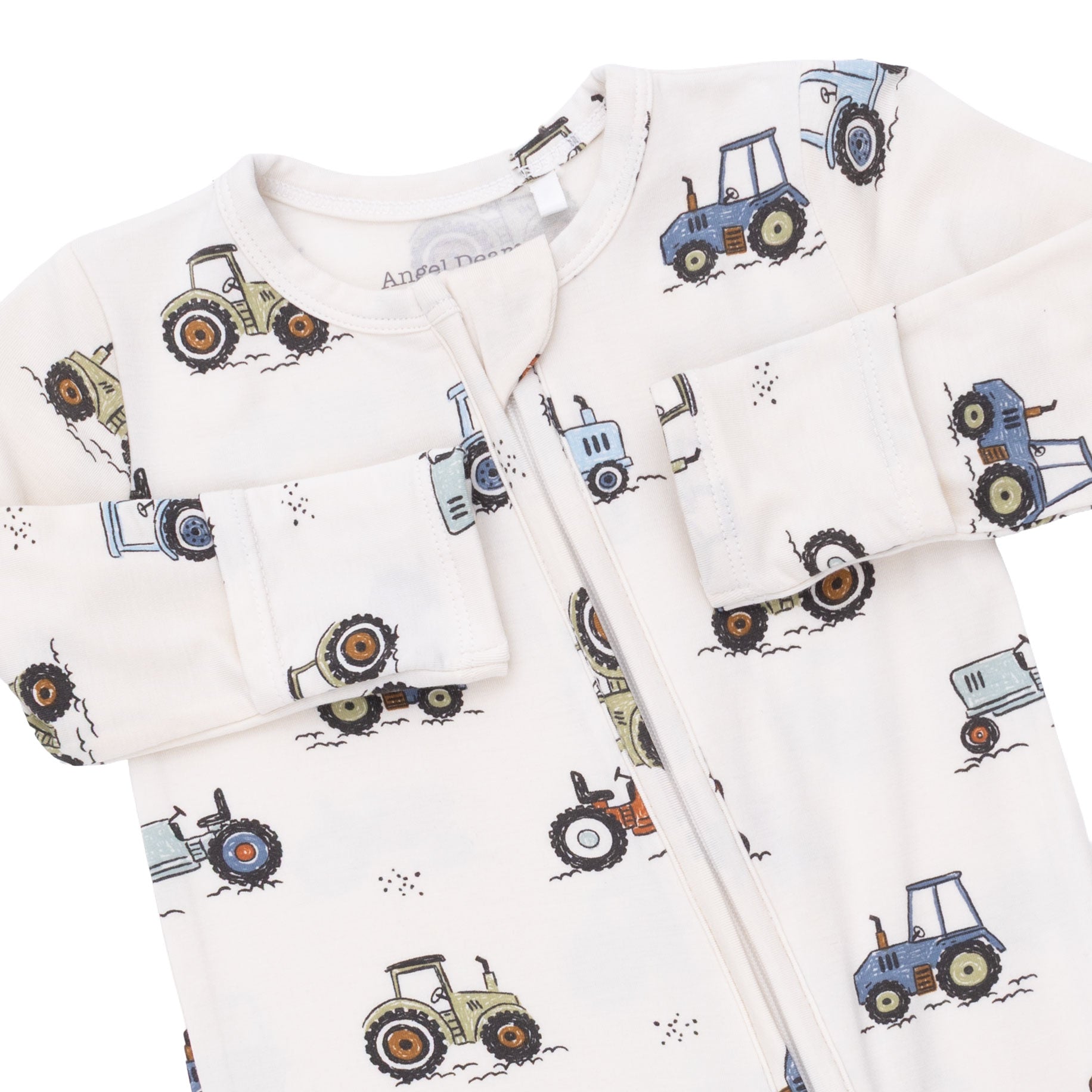 Baby outfit with tractor pattern on a white background