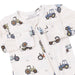 Baby outfit with tractor pattern on a white background