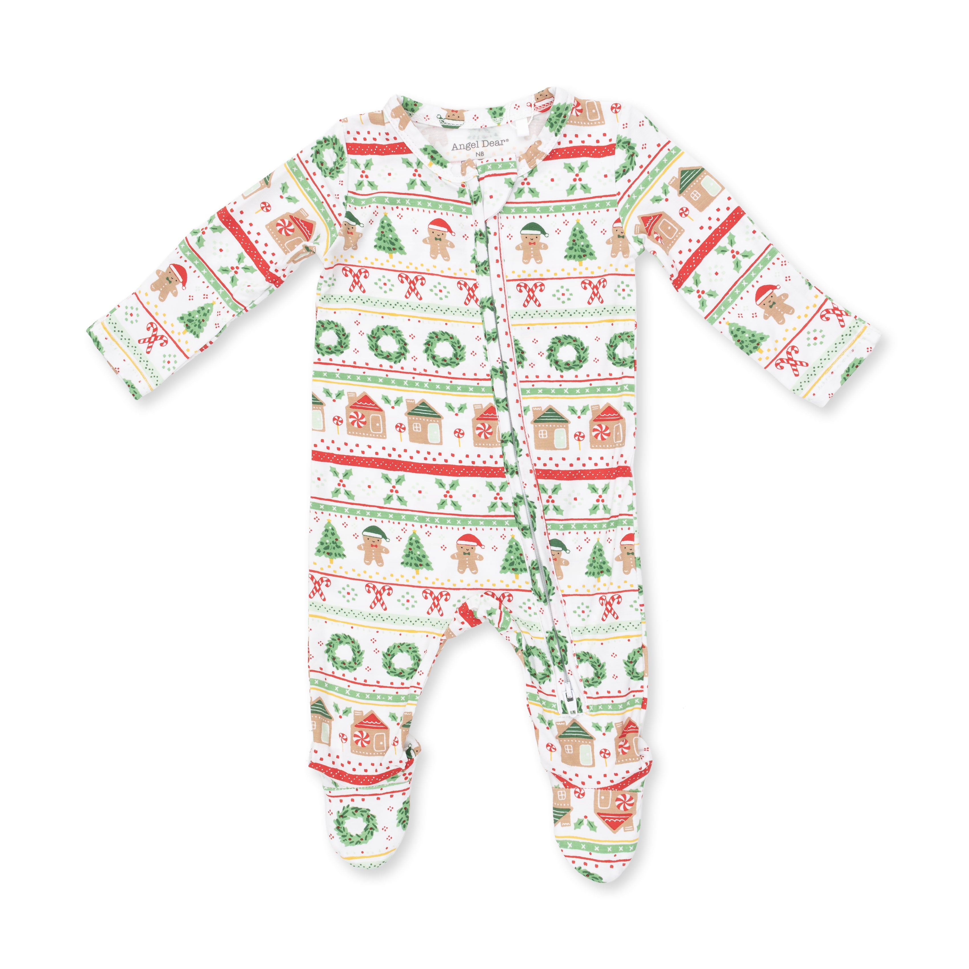 A baby long-sleeve footed sleeper with an all-over Christmas holiday print featuring gingerbread houses, Santa Claus, trees, and wreaths on a white background.