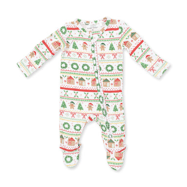 A baby long-sleeve footed sleeper with an all-over Christmas holiday print featuring gingerbread houses, Santa Claus, trees, and wreaths on a white background.