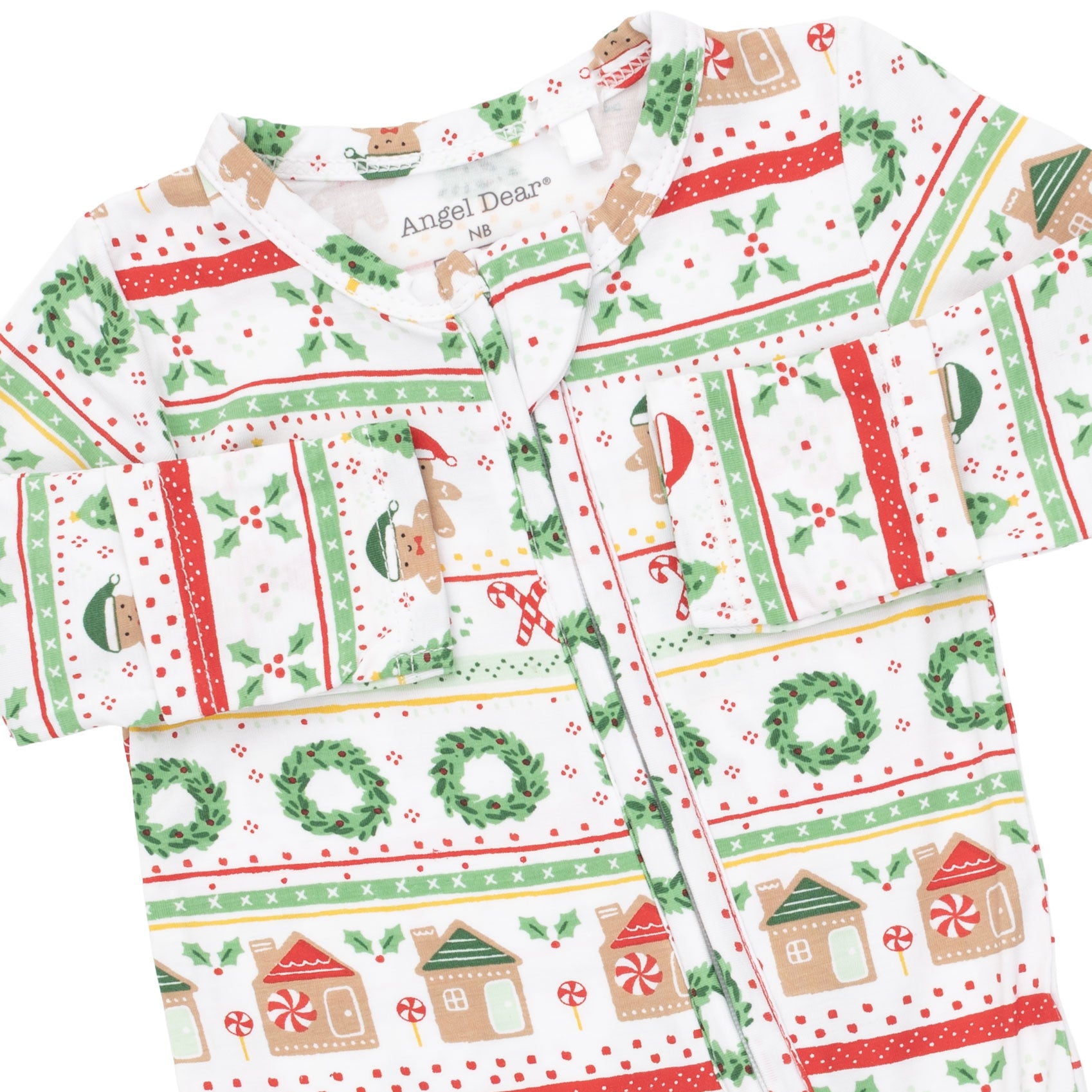 A long-sleeve button-up pajama shirt with a festive Christmas print, featuring green wreaths, red stripes, candy canes, gingerbread houses, and a white background. The brand name 'Angel Dear' is visible on the inner neck label.
