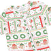 A long-sleeve button-up pajama shirt with a festive Christmas print, featuring green wreaths, red stripes, candy canes, gingerbread houses, and a white background. The brand name 'Angel Dear' is visible on the inner neck label.
