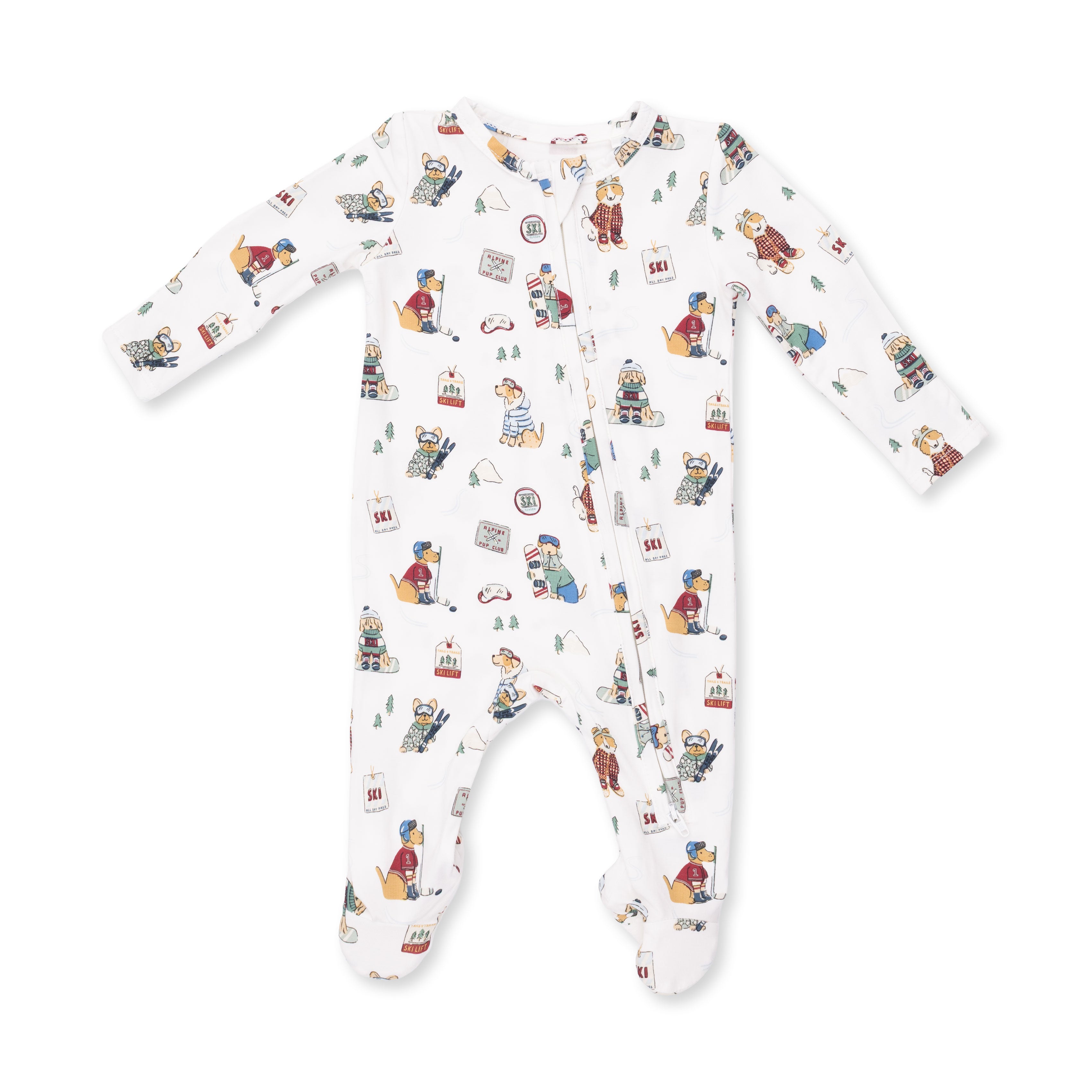 A white long-sleeve footed sleeper with an all-over print of winter sports dogs and winter-themed illustrations, laid flat on a white background.