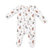 A white long-sleeve footed sleeper with an all-over print of winter sports dogs and winter-themed illustrations, laid flat on a white background.