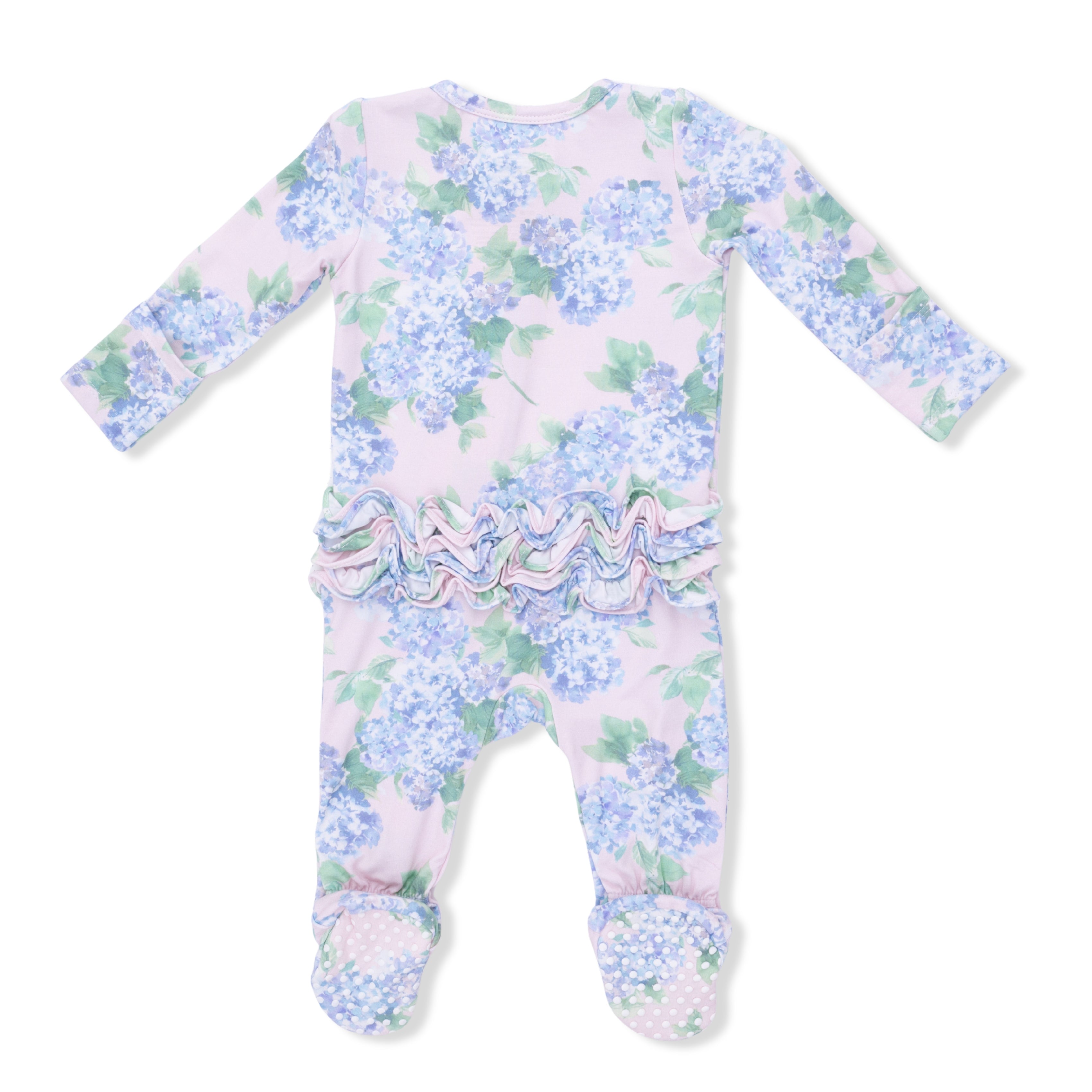 Baby footie with hydrangea pattern and ruffle details on a white background