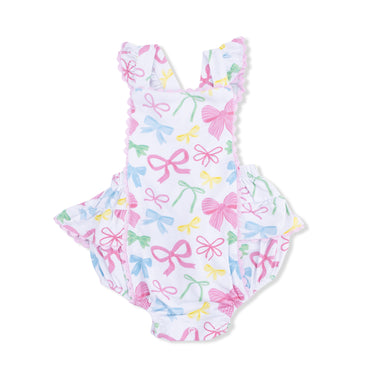 One-piece sunsuit with bow pattern on a white background