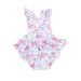 Girl's sunsuit with colorful bow pattern on a white background
