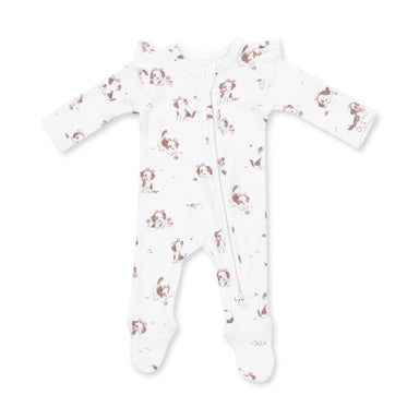 A white long-sleeve footed sleeper with a front zipper and an all-over print of brown and pink cartoon dogs, shown on a plain white background.