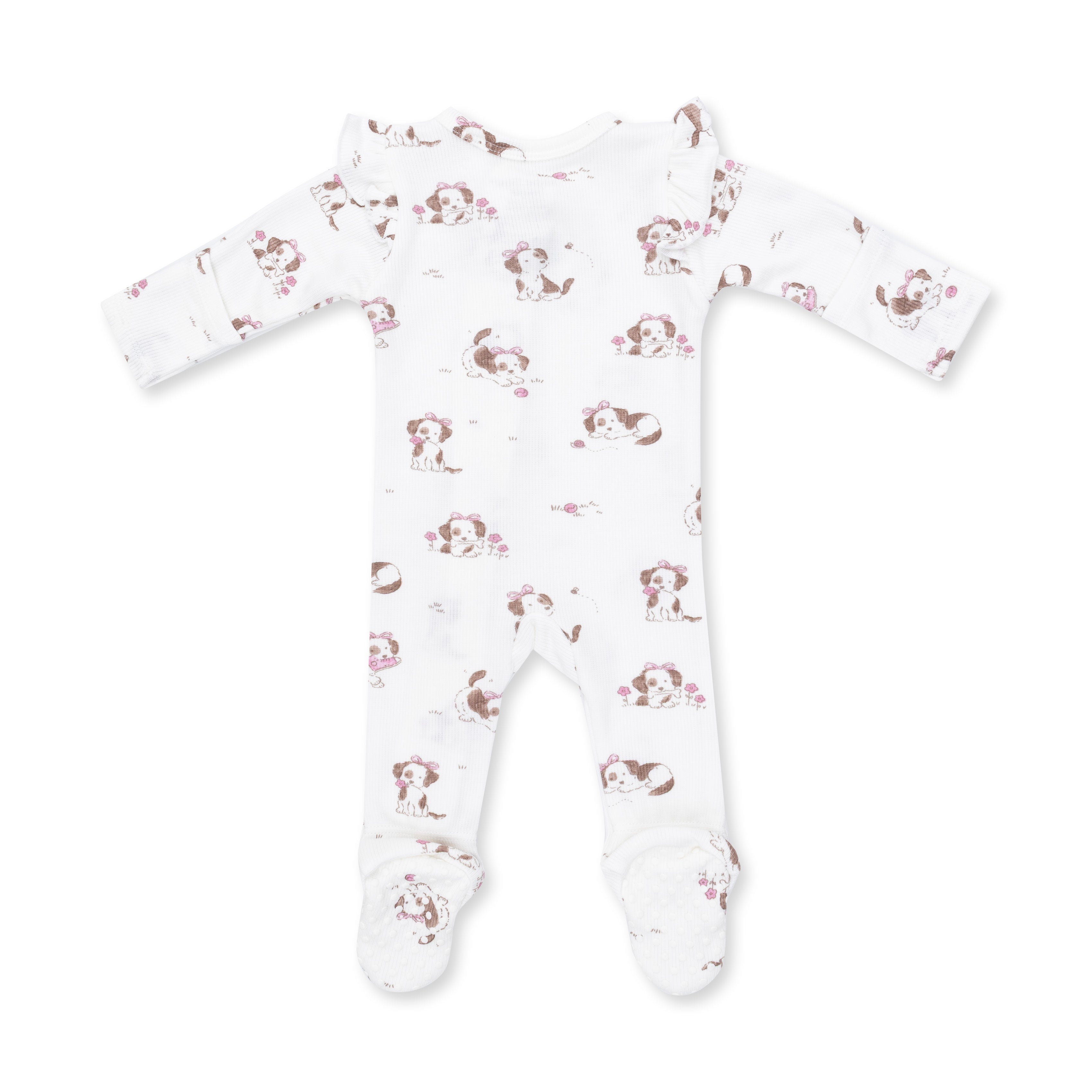 A white long-sleeve baby footed sleeper with an all-over print of brown and pink cartoon dogs, shown flat on a white background.