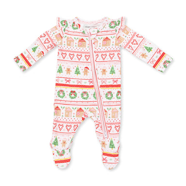 A baby long-sleeve footed sleeper with an all-over Christmas print, featuring gingerbread houses, Santa Claus, trees, and wreaths on a white background.