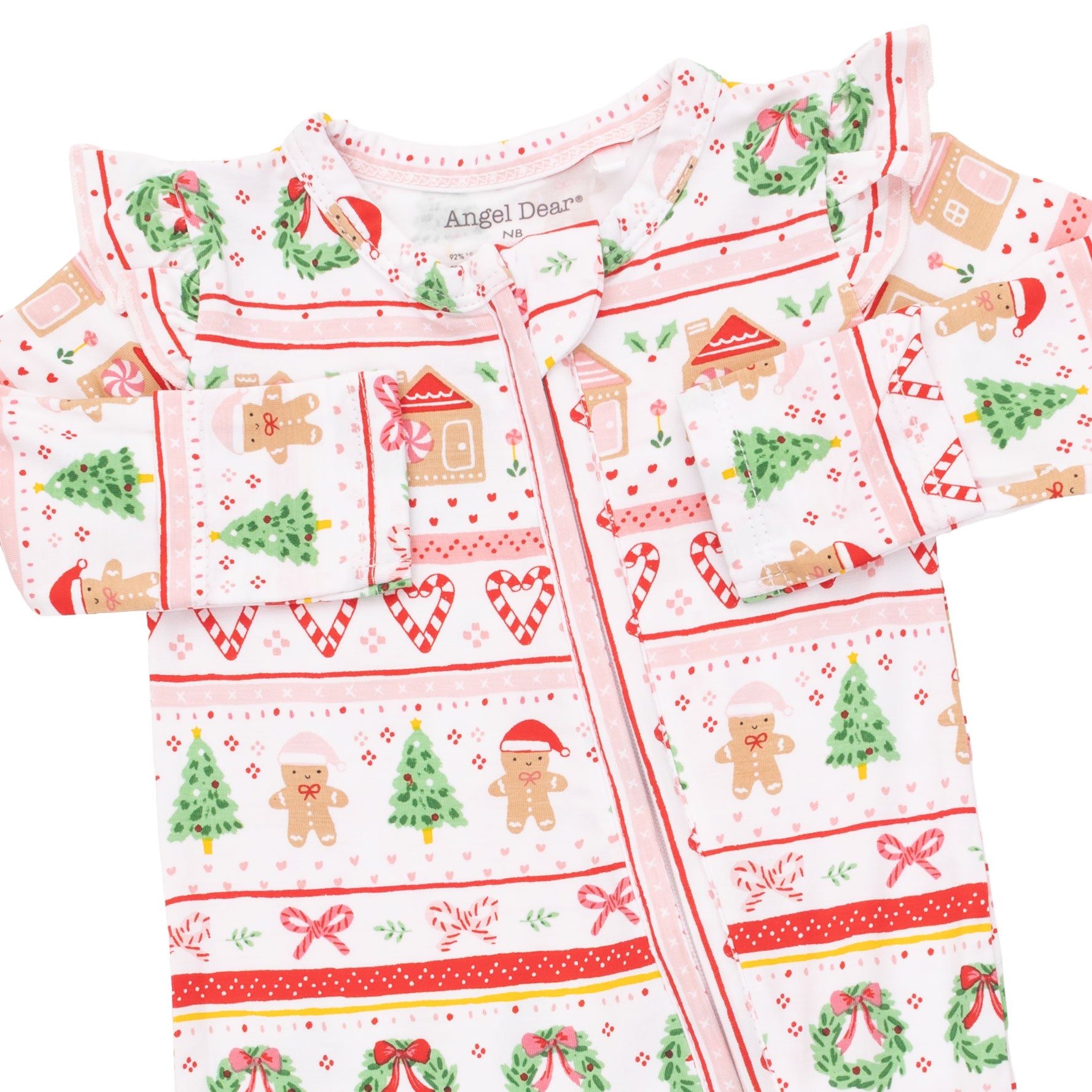 A baby long-sleeve footless onesie with a festive Christmas print, featuring gingerbread men, trees, wreaths, and candy canes on a white background with red and green patterns. The brand name 'Angel Dear' is visible on the inner neck label.