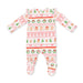 A baby footed one-piece sleeper with long sleeves, featuring a festive Christmas Fair Isle pattern with gingerbread houses, trees, wreaths, candy canes, and bows on a white background.