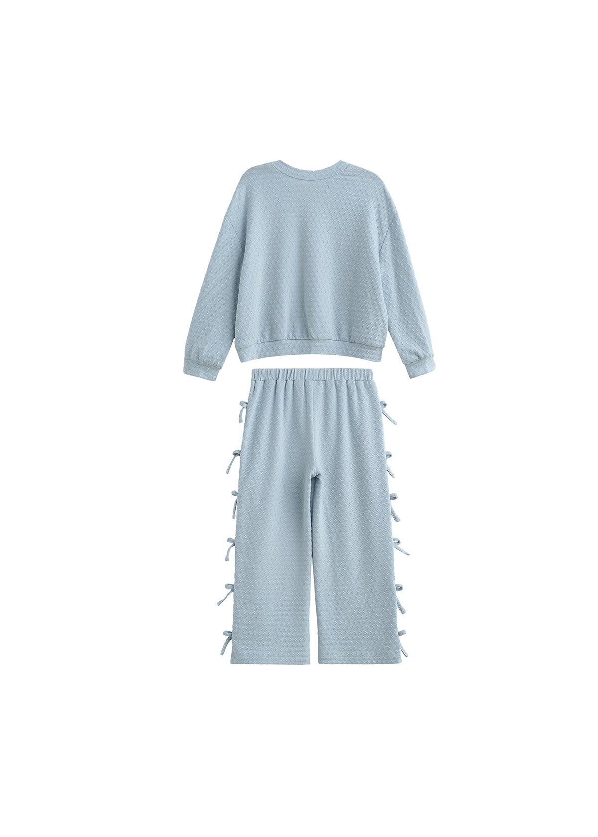 A light blue two-piece knit set featuring a cropped long-sleeve top and matching wide-leg pants with side tie details, displayed on a solid white background.