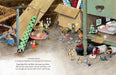 Illustrated page from A Mouse Family Christmas by Hachette Book Group showing mice decorating for Christmas among toys gifts and festive decorations
