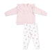 A toddler girl's two-piece clothing set featuring a light pink long-sleeve top with a ruffled collar and white leggings with a pink bow and gray polka dot pattern, laid flat on a white background.