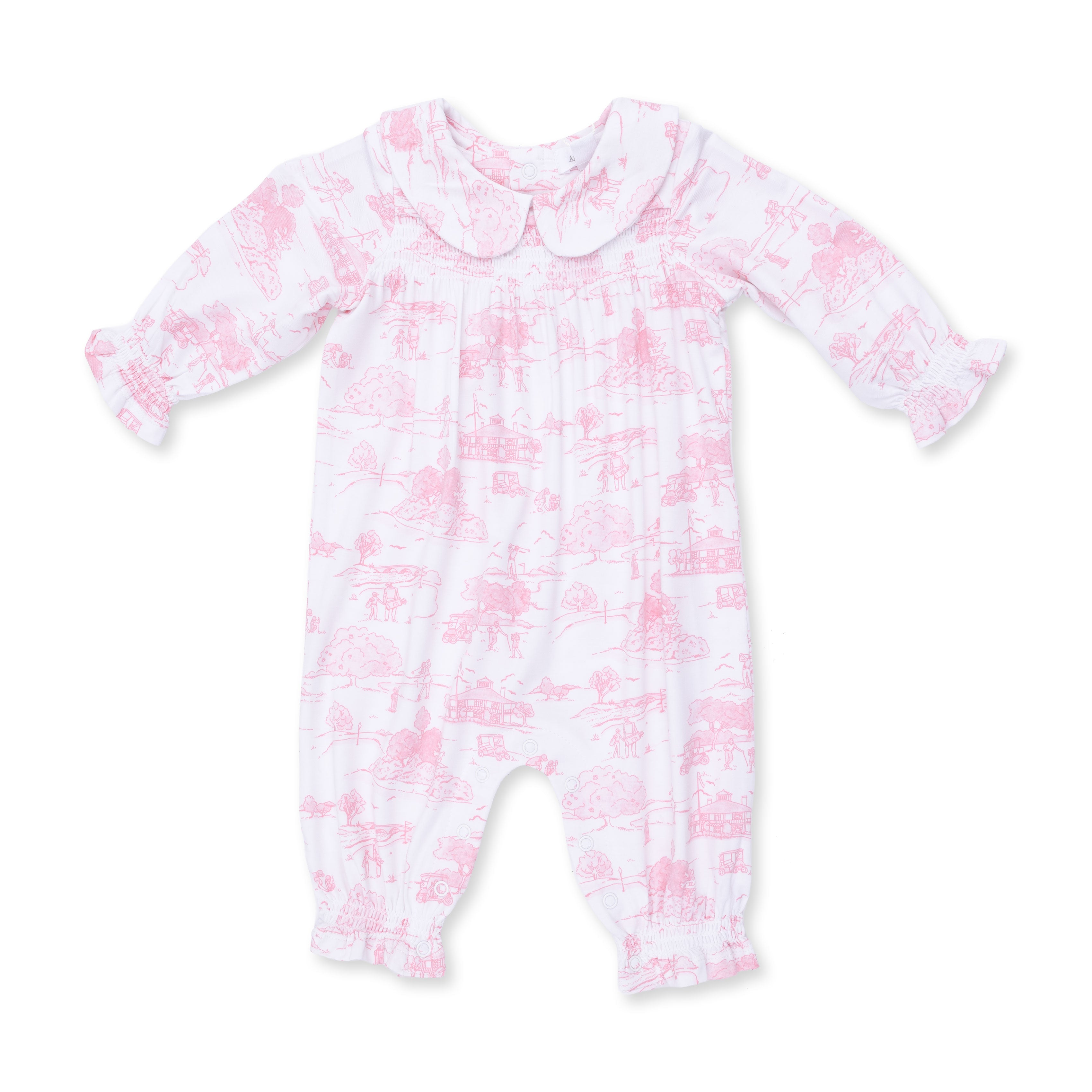 Pink and white toile baby onesie on a white background