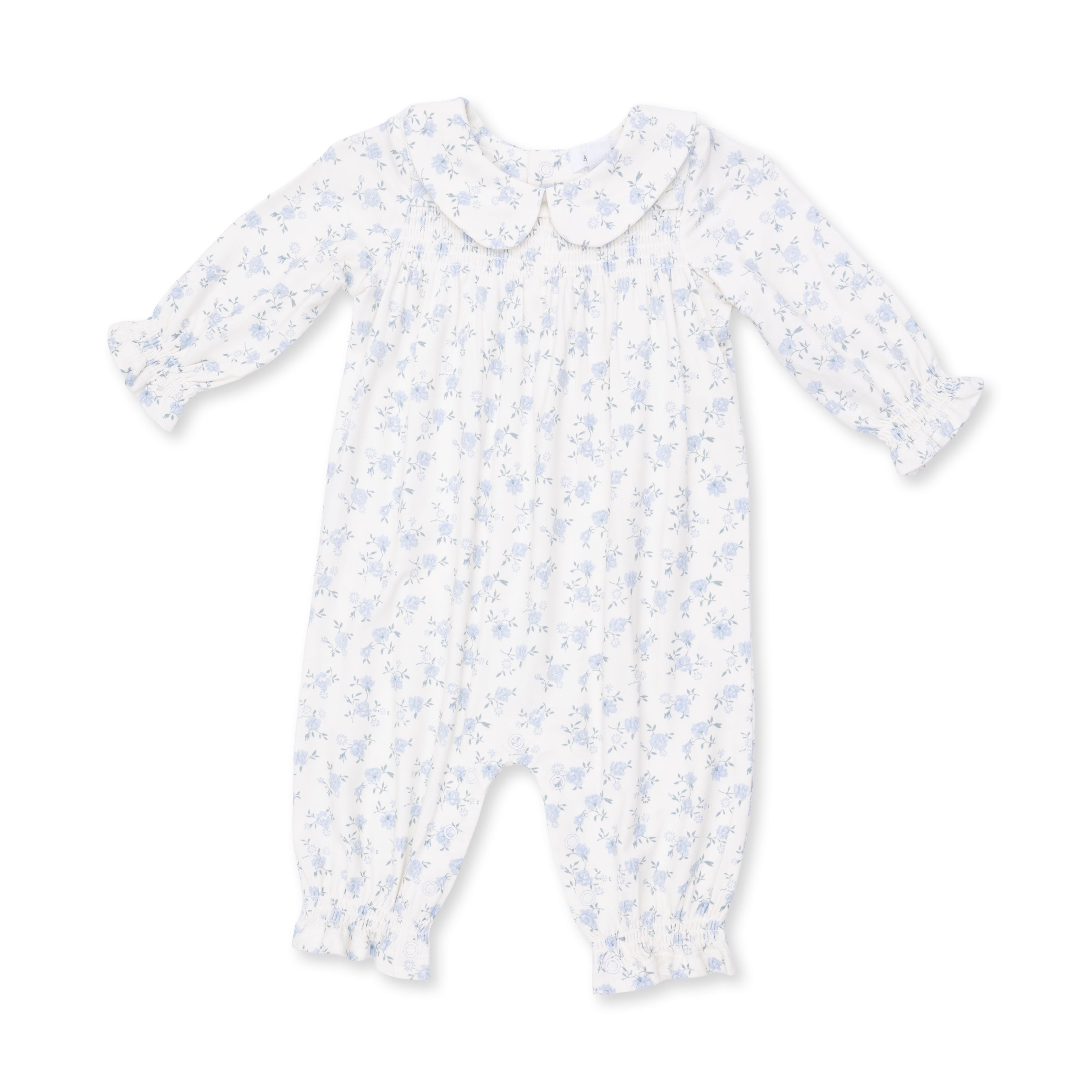 White baby onesie with blue floral pattern on a white background