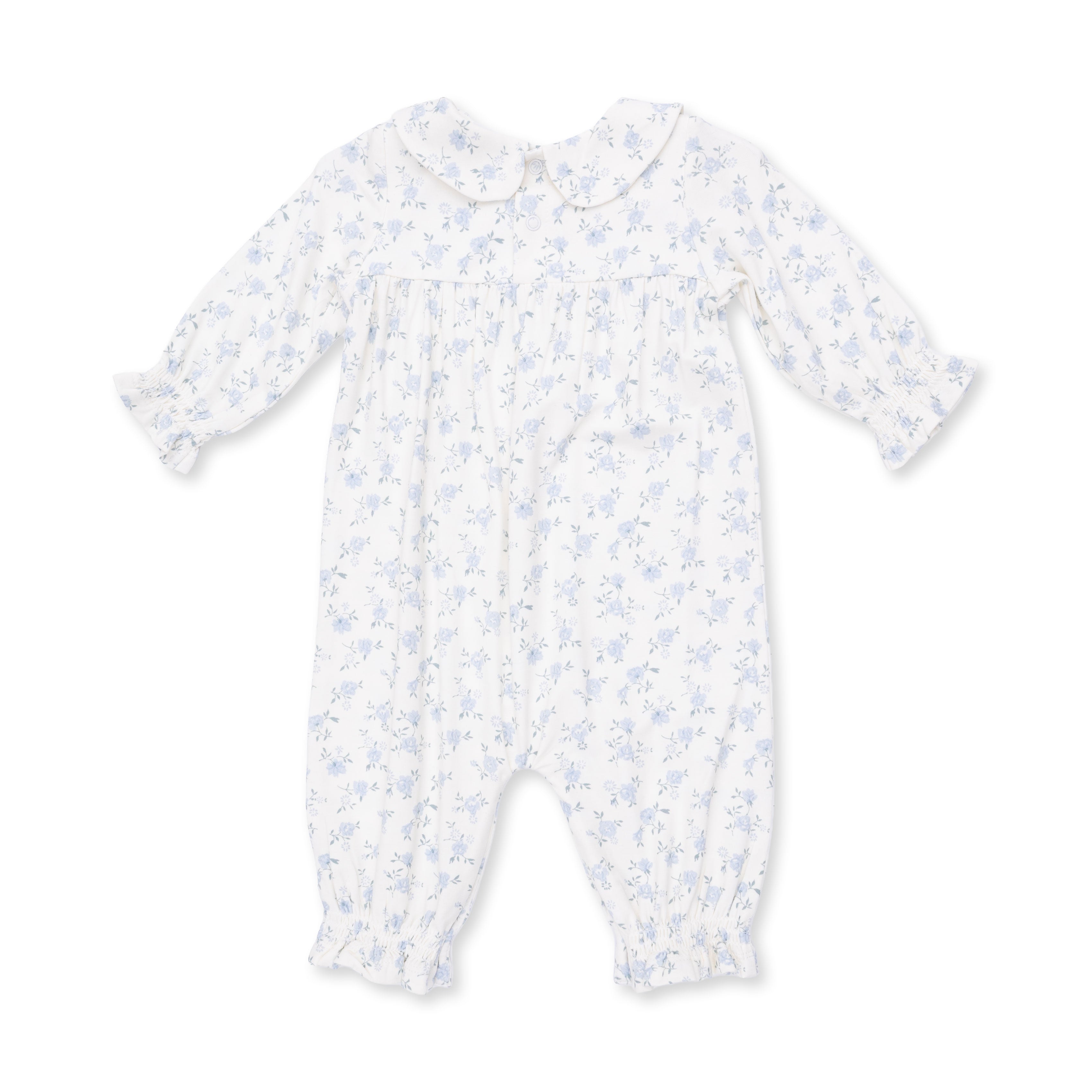 White baby onesie with blue floral pattern on a white background