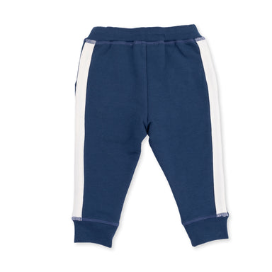 A pair of navy blue sweatpants for toddlers, featuring white side stripes and ribbed cuffs, shown flat on a white background.