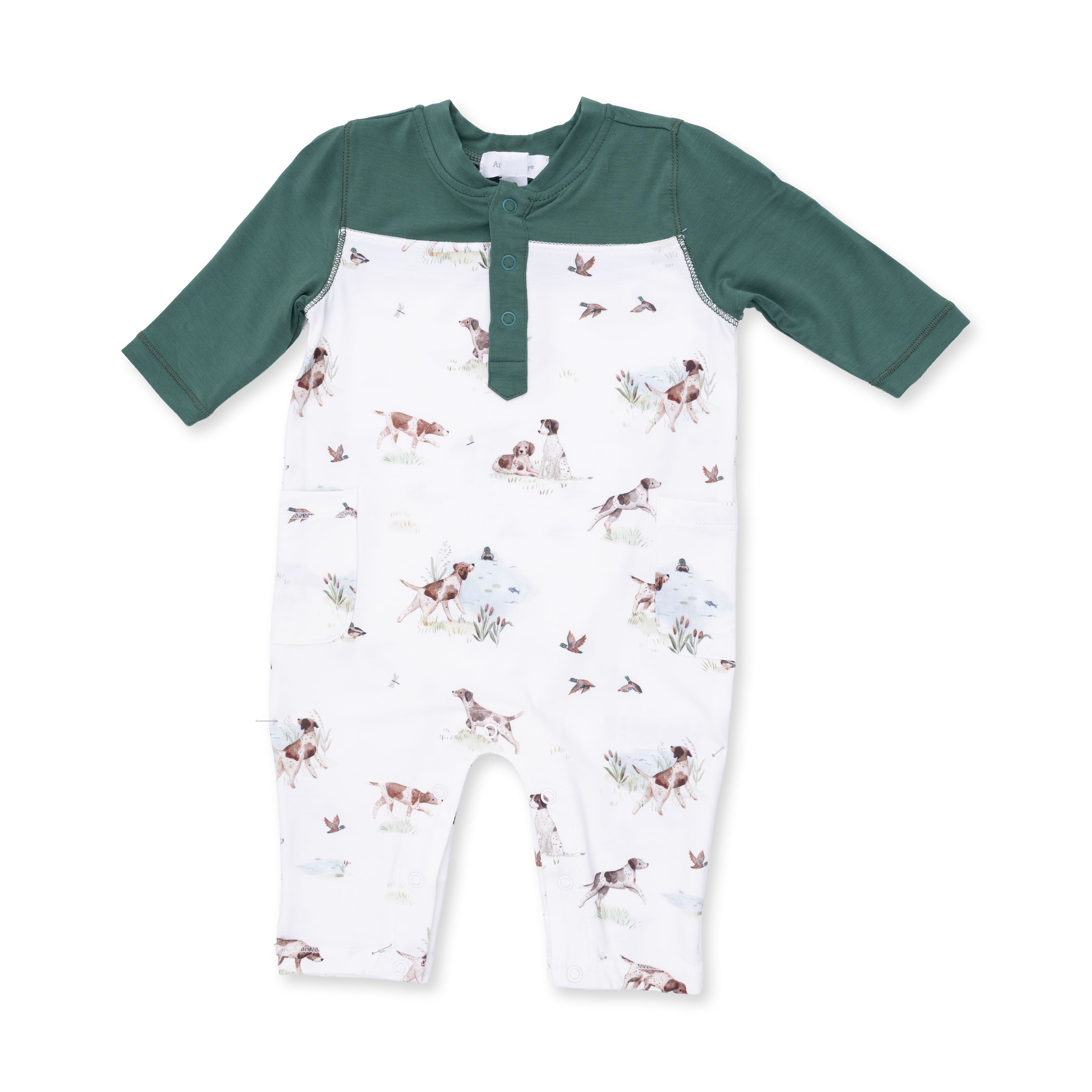 Baby romper with green sleeves and dog and duck pattern on a white background