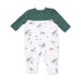 Baby romper with green long-sleeve top and dog and duck patterned white pants on a white background