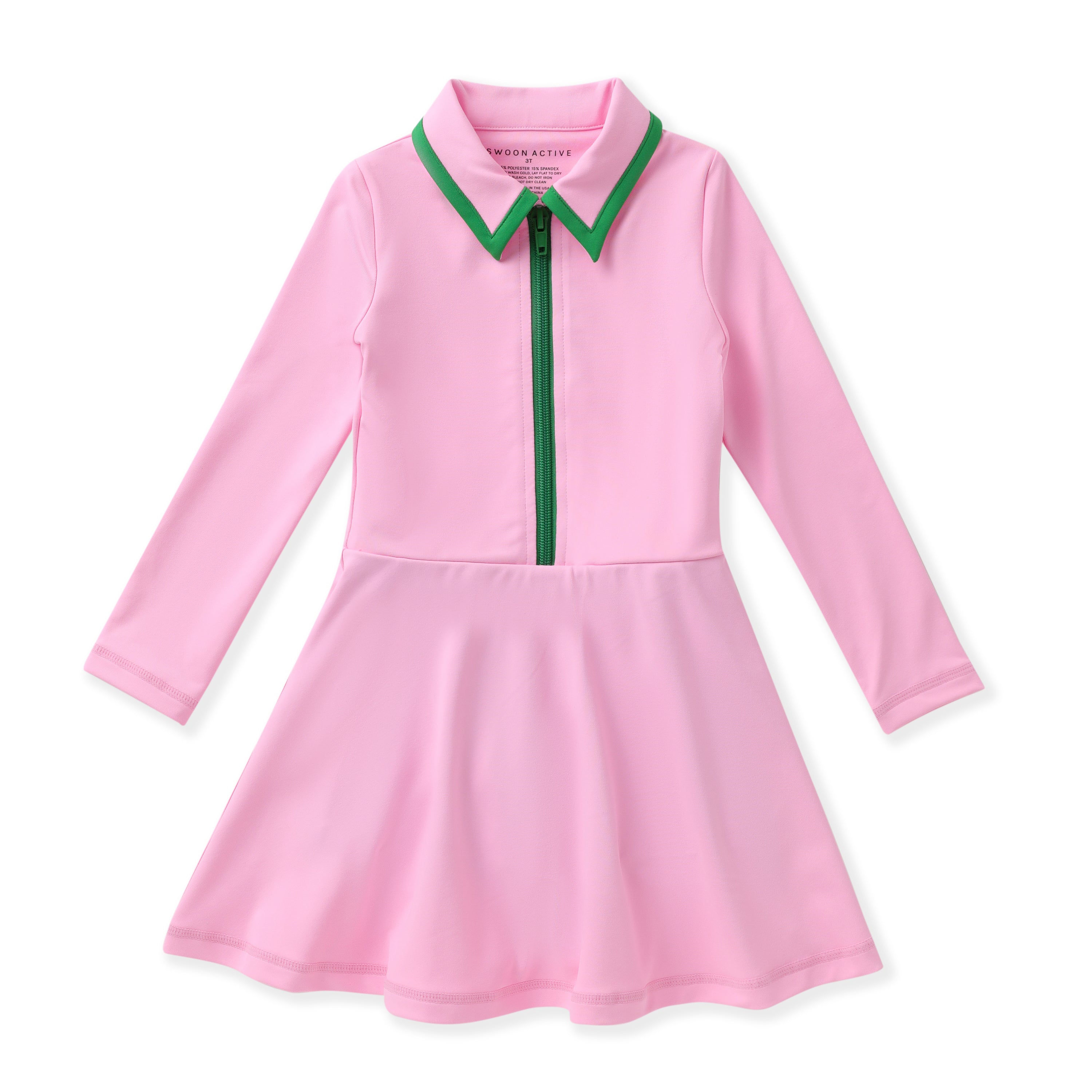 A pink long-sleeve tennis dress with a split neckline, featuring a green-trimmed collar and a green zipper detail down the front, displayed on a clean white background.
