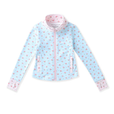 A light blue zip-up jacket with a pink and white florall print, featuring a pink zipper, pink collar lining, and matching pink cuffs, shown flat on a white background.