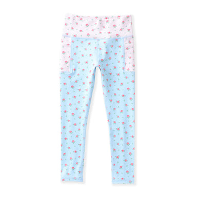 Light blue leggings with a small pink floral print and a contrasting light pink waistband, shown flat against a white background.