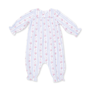 Smocked baby romper with floral pattern on a white background 
