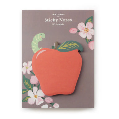 Sticky notes with an apple design on a brown background