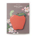 Sticky notes with an apple design on a brown background