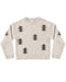 Beige sweater with Christmas tree patterns on a white background